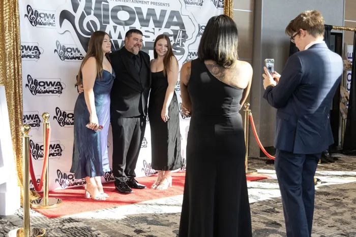 A group of guests photographed on the 2024 Iowa Music Awards red carpet